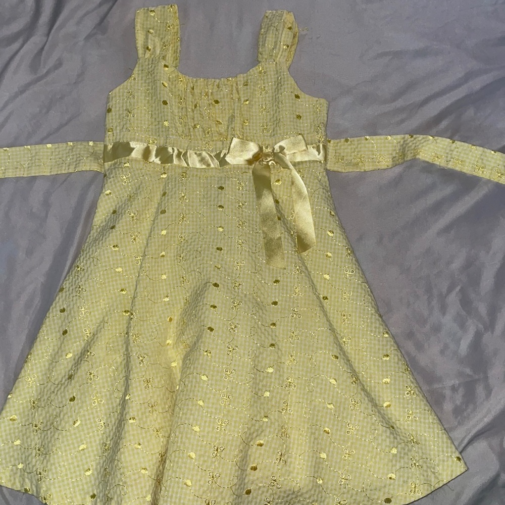 This is a yellow kids Bonnie Jean dress. Size US 5